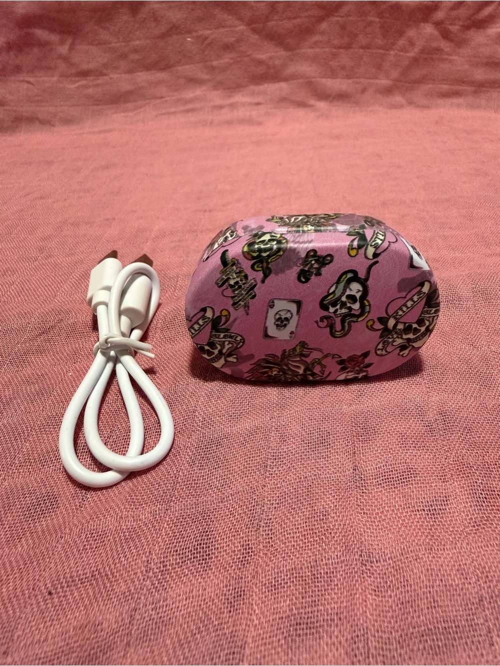 Ed hardy pink wireless earbuds with USB-C Cable